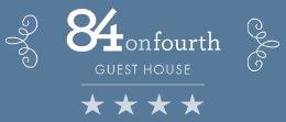84 on Fourth Guest House logo