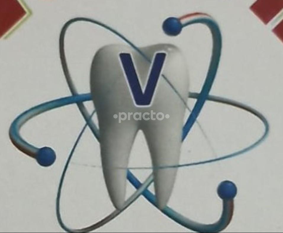 Dr.Valecha's multispeciality dental clinic and implant centre logo