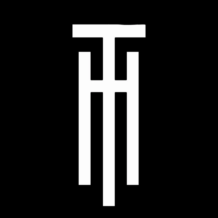 Houston Heights Tattoo & Piercing logo
